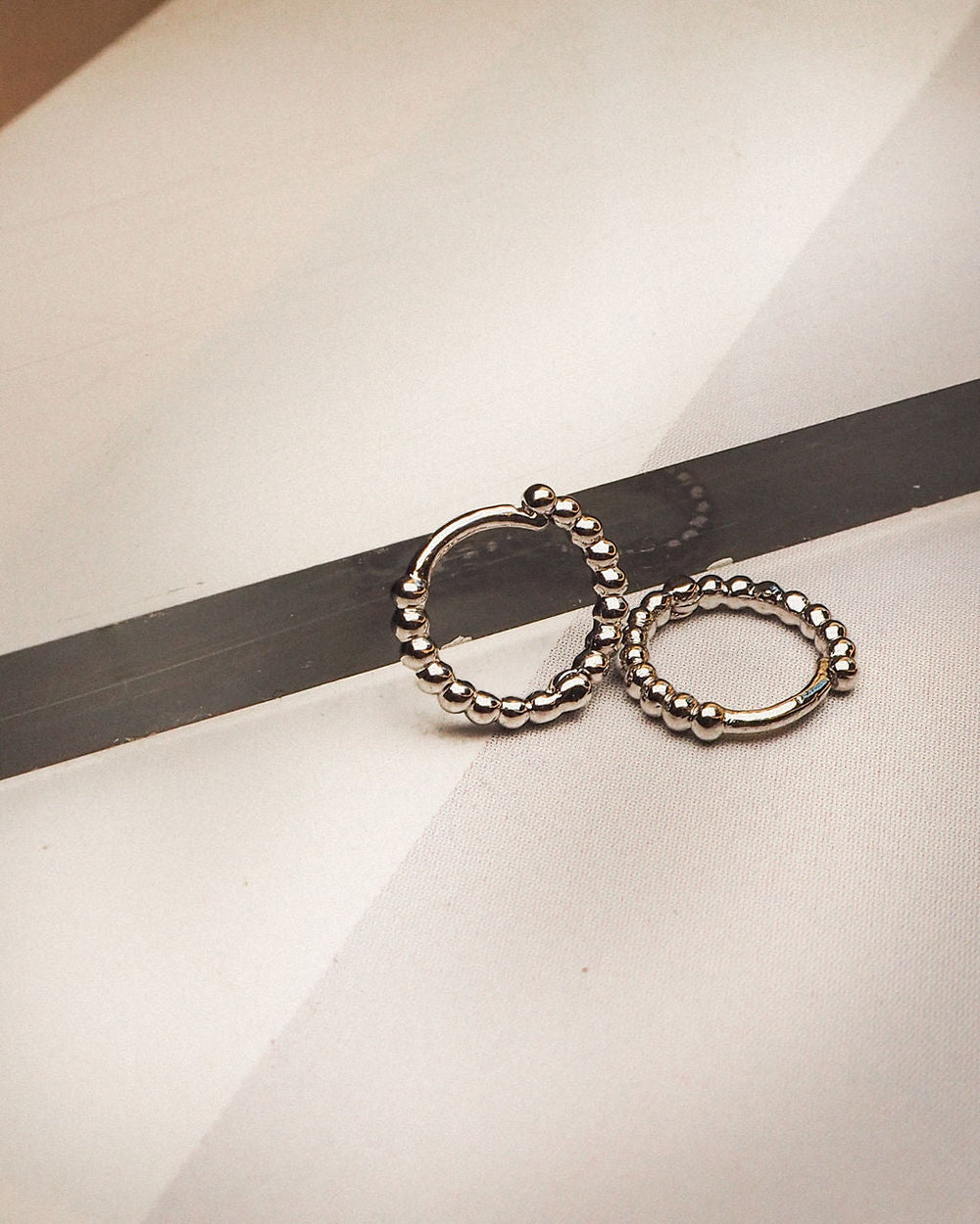 LUV AJ Mini Continuous Beaded Huggies - Silver-The Shop Laguna Beach